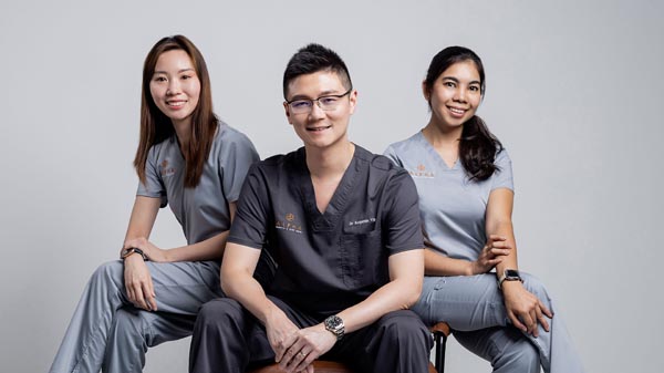 Dr Benjamin Yip with Alpha Digestive & Liver Centre staff