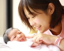 Image of newborn baby and smiling mother Image,Of,Newborn,Baby,And,Smiling,Mother